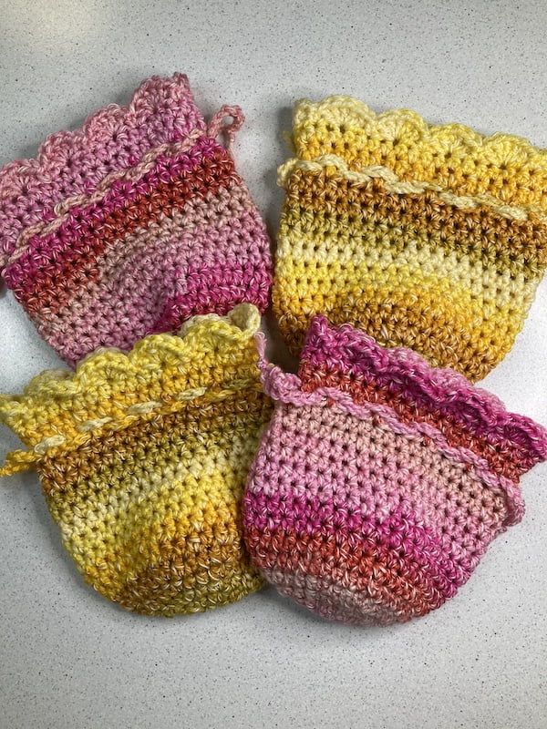 4 crochet treasure bags yellow and pink