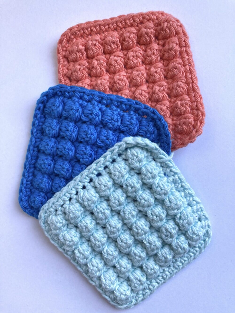 cotton-crochet-square-face-scrubbie-set-salmon-blue-light-blue