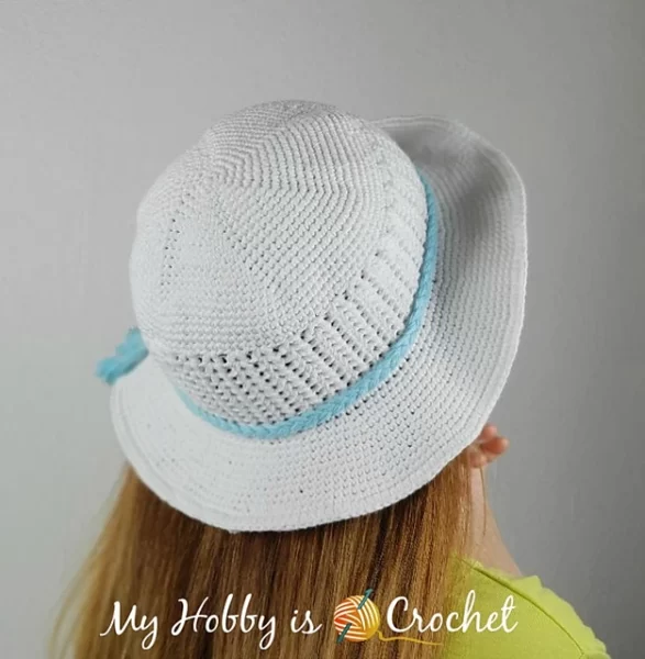White crochet sun hat with blue band